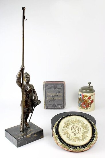 Convolute Studentika, late 19th century, consisting of: Jug of the Hannoverania fraternity, with coat of arms, motto and date. 1897, h: 15 cm; regular figure of a fraternity member in full cum, holding a flagpole, but without the flag, on marble base...