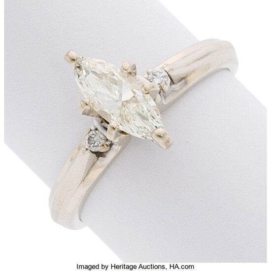 Diamond, White Gold Ring The ring features a marquise-shaped...