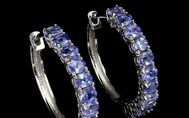 Earrings in rhodium-plated sterling silver with tanzanites