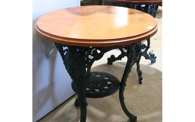 English cast iron and wood pub table, female mask heads to t...