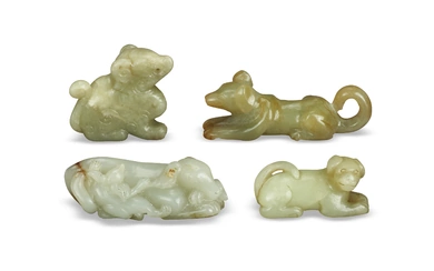 FOUR JADE CARVINGS OF DOGS CHINA, LATE QING DYNASTY OR LATER