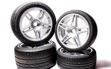 Four Ferrari Enzo Wheels with Tyres §