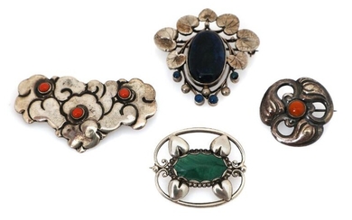 SOLD. Four brooches respectively set with amber, corals, lapis lazuli and malachite, mounted in silver. (4) – Bruun Rasmussen Auctioneers of Fine Art