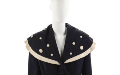 Gianna Spocci, Black jacket with light-colored details.