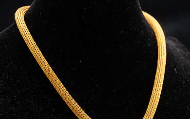Gold necklace with diamond-studded elements.