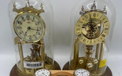 Group of clocks by Elgin, Kundo and Hamilton . Pocket watches by Hamilton