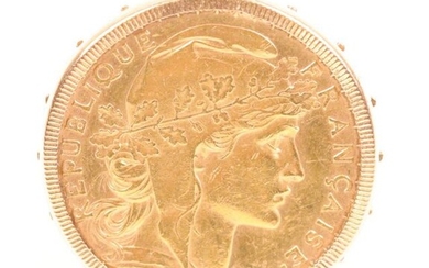 Knight's ring in gold (750) enclosing a 20 Francs gold coin Marianne 1904, T: 58. Weight : 11.8 gr