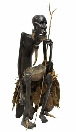 LARGE AFICAN CARVED SEATED TRIBAL FIGURE