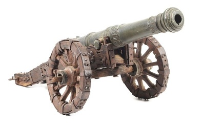 LATE 17TH CENTURY OR EARLY 18TH CENTURY FIRING BRONZE CANNON MODEL WITH ORIGINAL CARRIAGE.