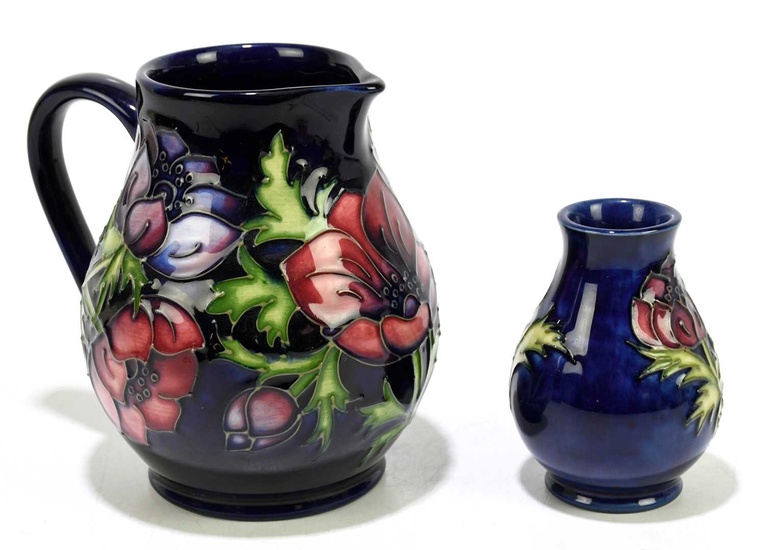 MOORCROFT; two pieces decorated in the 'Anemone' pattern, comprising a...