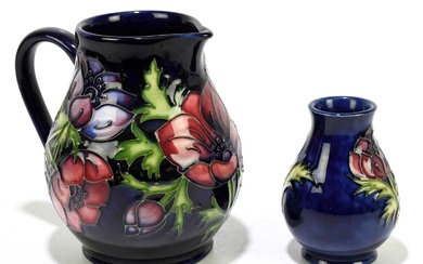 MOORCROFT; two pieces decorated in the 'Anemone' pattern, comprising a...
