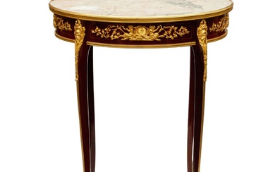 Magnificent mahogany and gilded bronze table by François Linke.