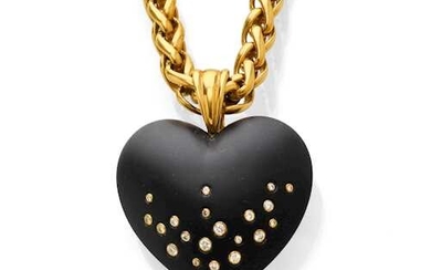ONYX, DIAMOND AND GOLD PENDANT WITH CHAIN.