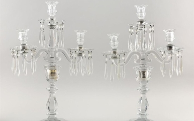 PAIR OF CLEAR GLASS CANDELABRA Each with three socles with matching bobèches. Heights 21".