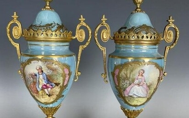 PAIR OF FRENCH ART NOUVEAU ORMOLU MOUNTED SEVRES VASES