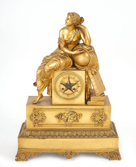 Pendule en bronze doré figurant la Science représentée par une femme drapée à l antique,...