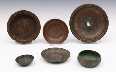 Persia and Ottoman, a collection of six antique bronze bowls, 11th - 17th century;