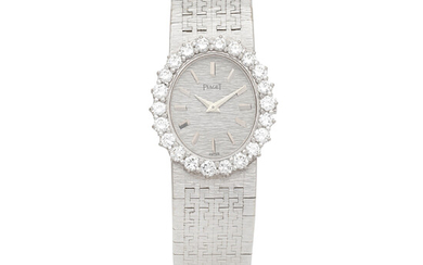 Piaget. A lady's 18K white gold diamond set manual wind bracelet watch Ref 9338 A6, Circa 1980