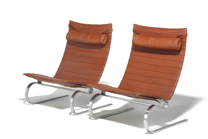 Poul Kjærholm: “PK 20”. A pair of lounge chairs with chromed steel frame. Seat, back and neckrest upholstered with reddish brown leather. (2)