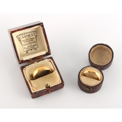 Property of a deceased estate - two plain 22ct yellow gold w...