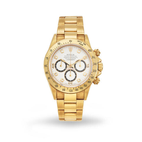Rolex. An 18K gold and diamond automatic chronograph bracelet watch