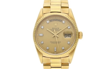 Rolex Reference 18038 Day-Date | A yellow gold automatic wristwatch with day, date, and bracelet, Circa 1985
