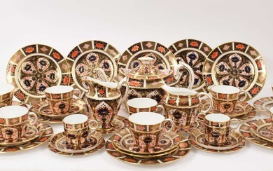Royal Crown Derby Imari pattern 1128 tea and coffee service, to include a teapot, milk jug, cream jug, two sugar bowls, six coffee cups with saucers and side plates, and six tea cups with saucers a...