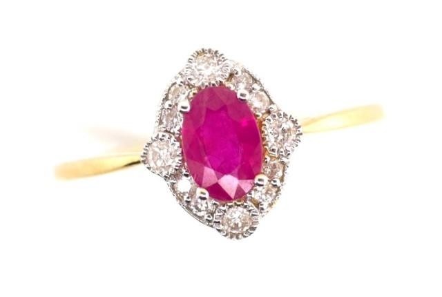 Ruby and diamond set 18ct yellow gold ring marked 750. Appro...
