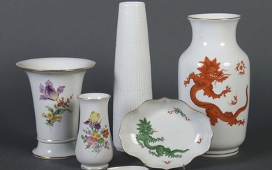 Six pieces of Meissen porcelain, after 1934, porcelain, glazed, mostly decorated by onglaze painting, a small vase and a trumpet vase with flower bouquets, an oval bowl and an ash bowl with the decoration ''Green Ming Dragon'', a big vase ''Red Ming...