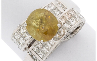 Sphene, Diamond, White Gold Ring The ring features an...
