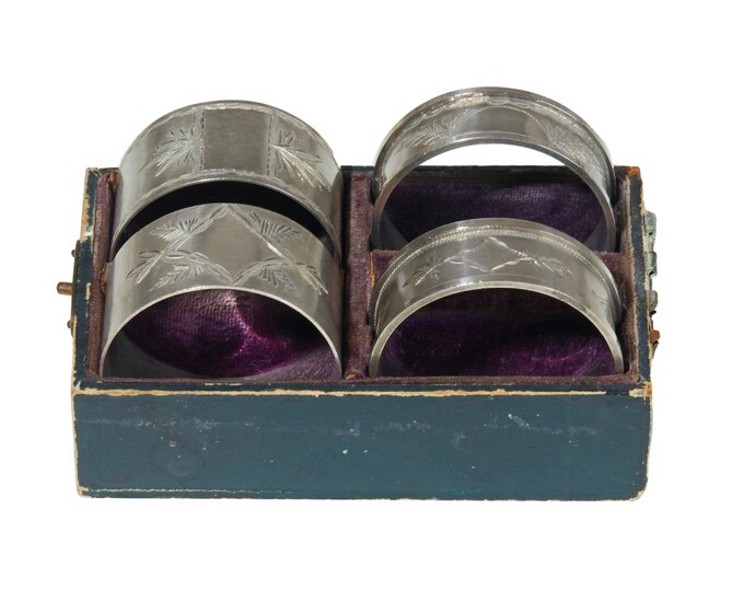 TWO PAIRS OF DEMI BROTHERS STERLING SILVER NAPKIN RINGS IN BOX