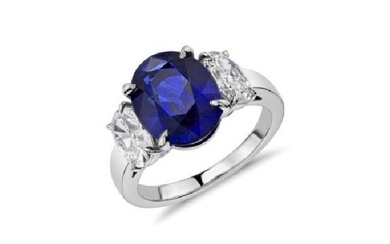 Tanzanite And Diamond Oval 3-stone Ring In 18k White Gold (11x8mm)