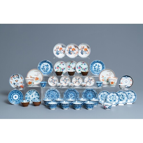 Twenty-four Chinese cups and twenty-five saucers in blue and...