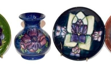 Two Moorcroft pin dishes, a small dish and a squat...