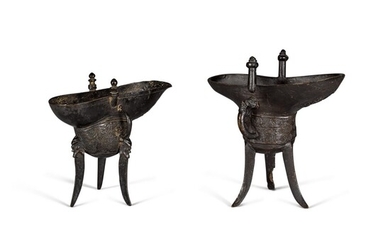 Two inscribed and dated archaistic bronze tripod vessels, jue One dated Jiajing mark and period, the other dated third year of the Qianlong reign (corresponding to 1738) | 清乾隆三年（1738年）銅仿古爵 及 明嘉靖 銅仿古爵 一組兩件