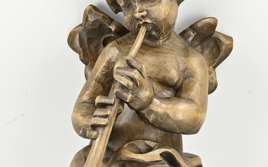 Wood carved angel with trumpet. 20th century. Size: 45 cm. In good condition.