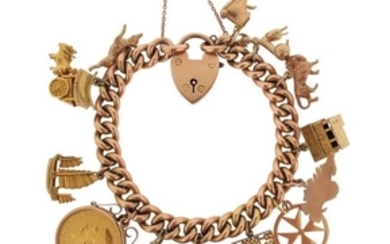 A gold charm bracelet, the curb link bracelet susp…