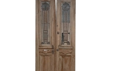 Salvaged Wooden Doors with Iron Centers