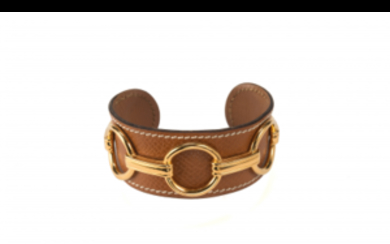 HERMES Hazelnut leather and horse-bit gilt-metal motif cuff bracelet...