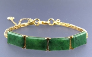 18 kt rose gold bracelet set with 4 baguette cut Jadeite pieces