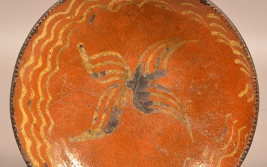 19th Century Yellow Slip Decorated Redware Charger.