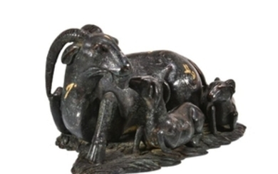 A Chinese inlaid bronze ‘three rams’ paperweight