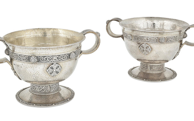 A pair of English hammered silver bowls