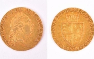 GEORGE III, 1760-1820. GUINEA, 1787 Obv: Laureate bust right. Rev: Crowned 'spade'-shaped shield. GVF. (1 coin)