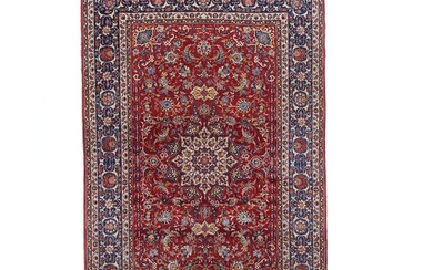 An Isfahan rug, Persia. Medallion design. C. 1940. 231×147 cm.