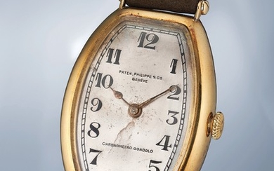 Patek Philippe, An extremely rare yellow gold tonneau shaped wristwatch with box