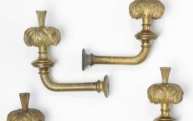 A set of four gilt bronze curtain tiebacks