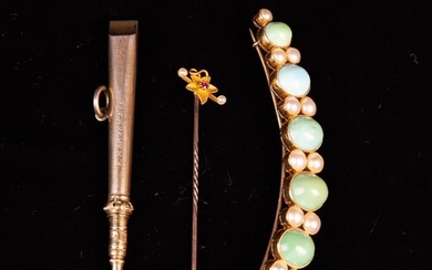 A 15 Carat Gold Tie Pin set with seed pearls and a ruby to a small gold flower head. A gilt pendant
