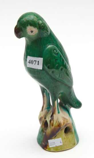 A 19TH CENTURY CHINESE GREEN GLAZED PORCELAIN PARROT (SMALL)