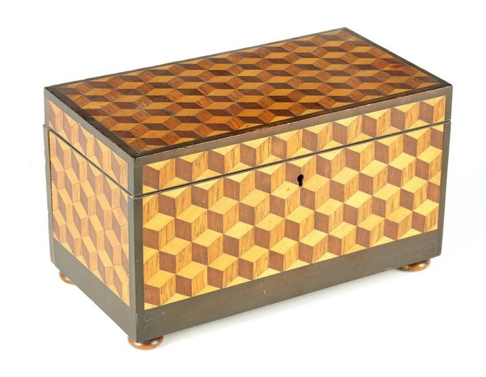 A 19TH CENTURY CUBE PARQUETRY TEA CADDY inlaid with
